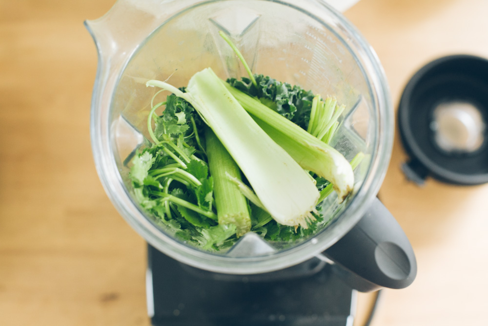 This everyday kale drink is easy to make, filled with nutrients and has a refreshing, earthy taste that's kissed with sweetness--and a kick of heat! Drink it to load up on nutrients this winter. #kale #coldseason #healthydrinks